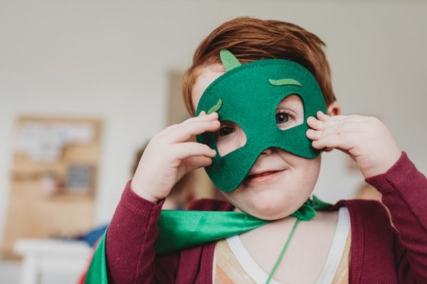 Indoor activities with kids can include pretend play with fancy dress